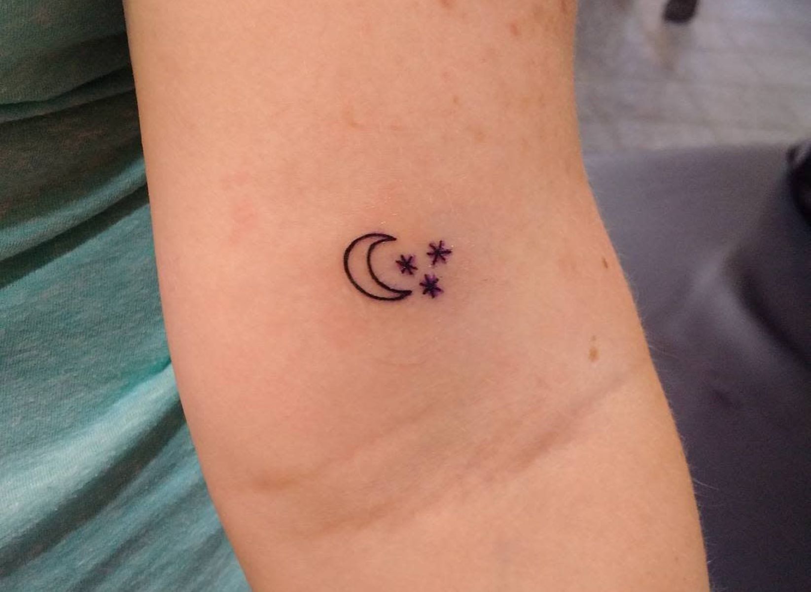 The Hidden Meaning Behind A Dream Tattoo: A Crescent Moon And Three Stars On The Wrist