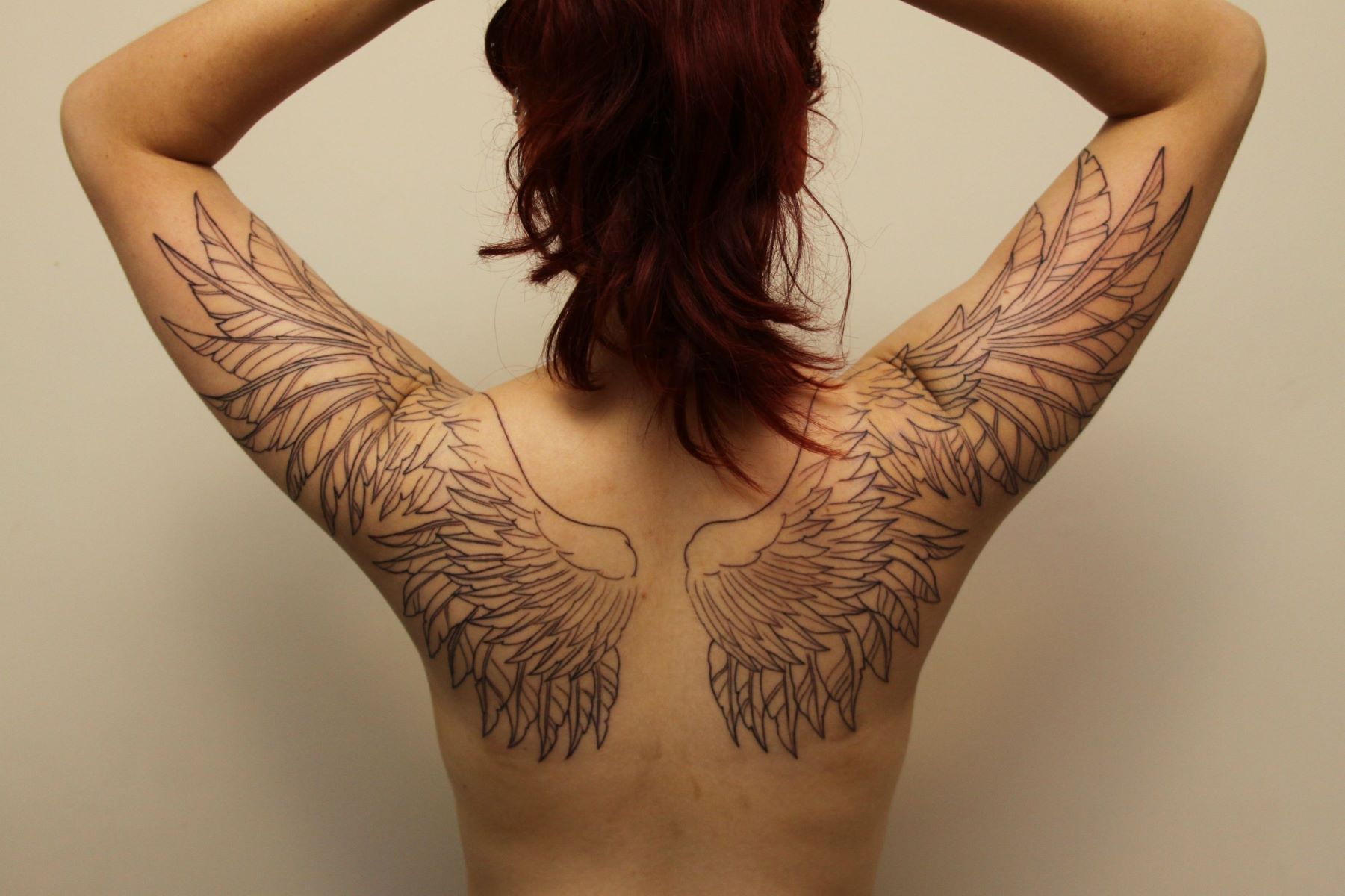 The Hidden Meaning Behind Wing Tattoos Revealed!