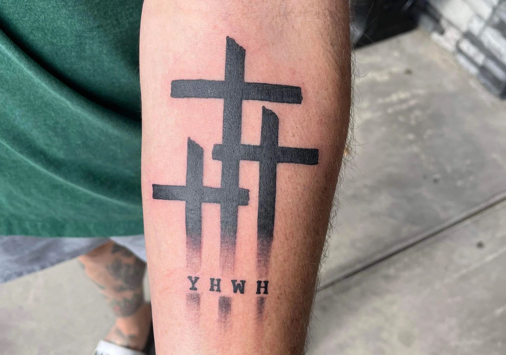 The Hidden Symbolism Behind The 3 Crosses Tattoo