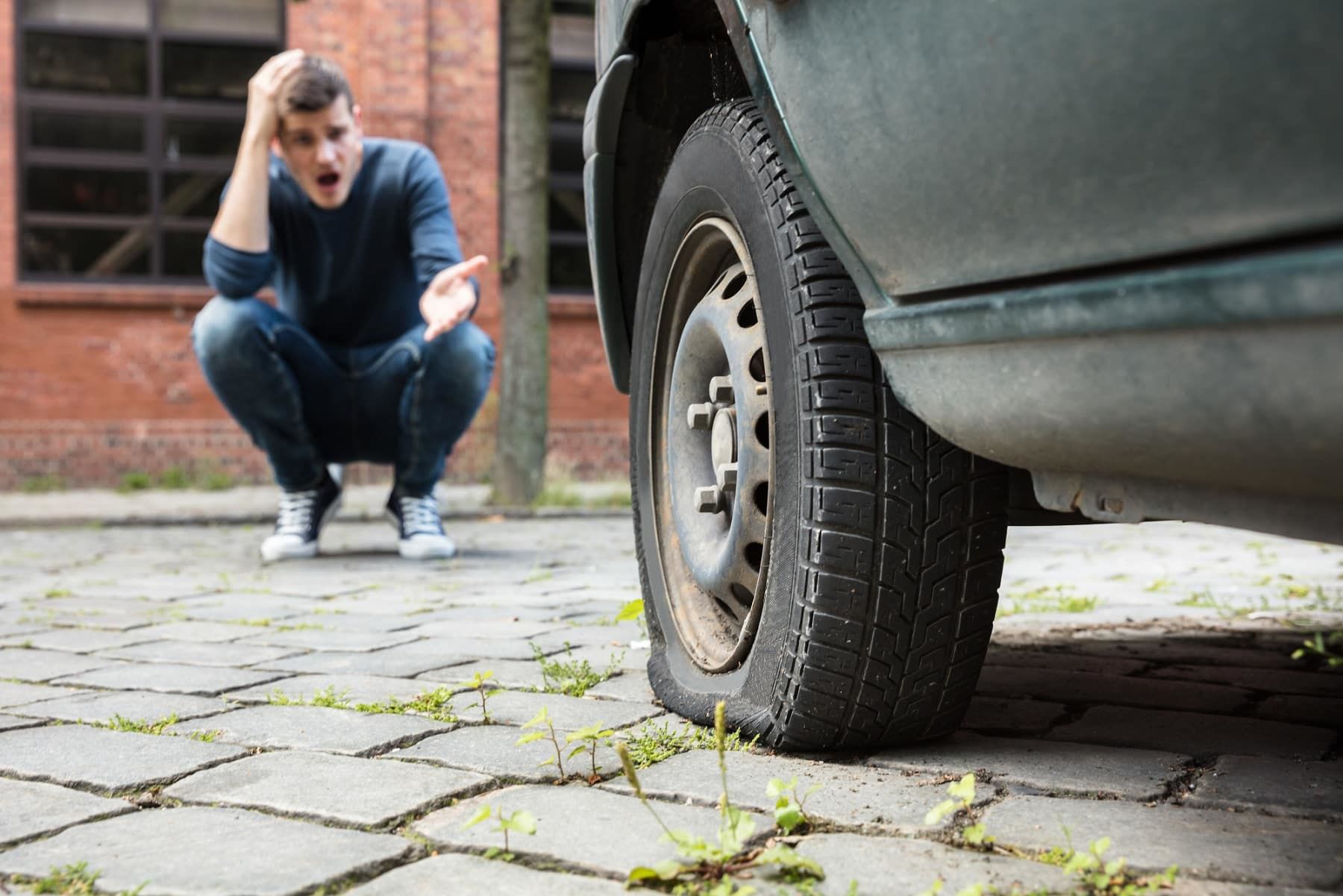 The Surprising Meaning Behind Dreaming Of Flat Tires On A Car