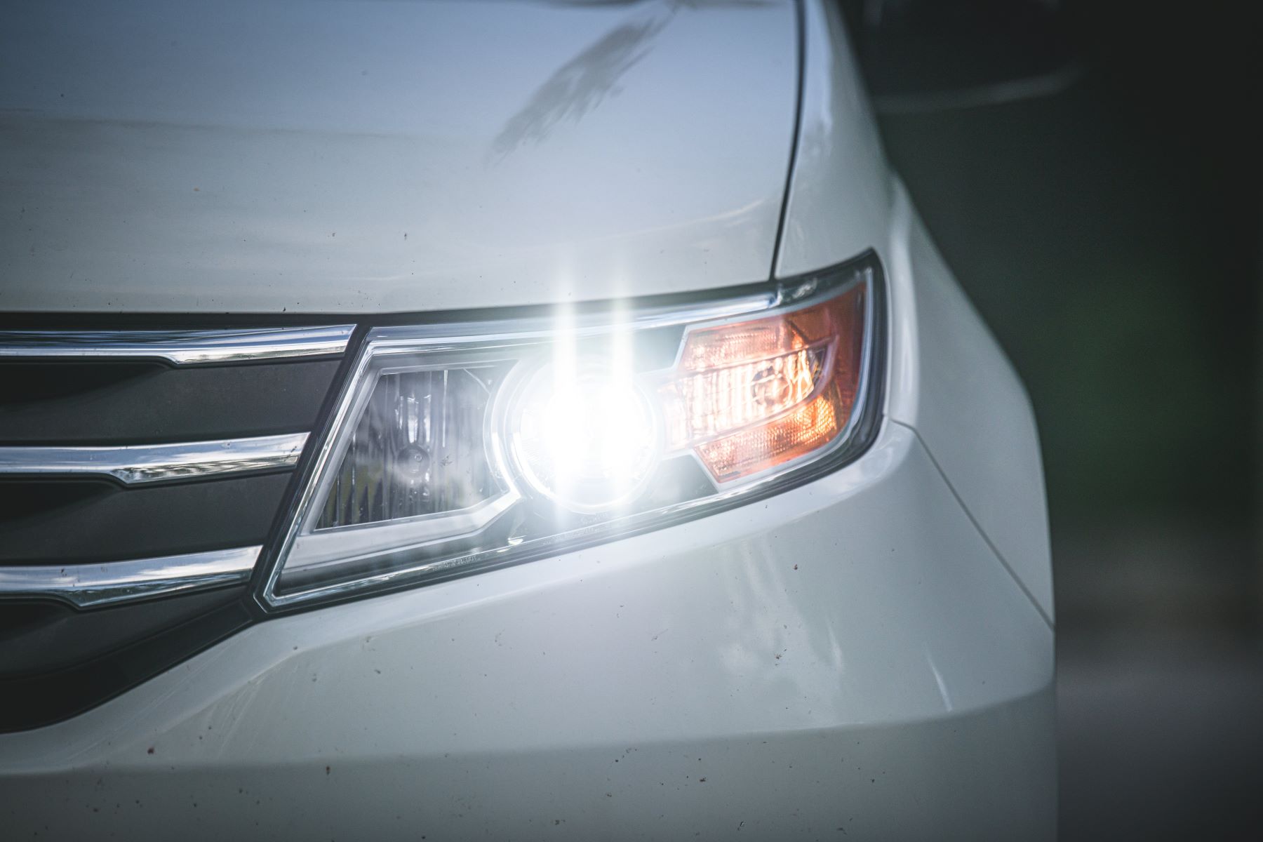 The Surprising Reason Car Headlights Flash When Turned Off And On Again