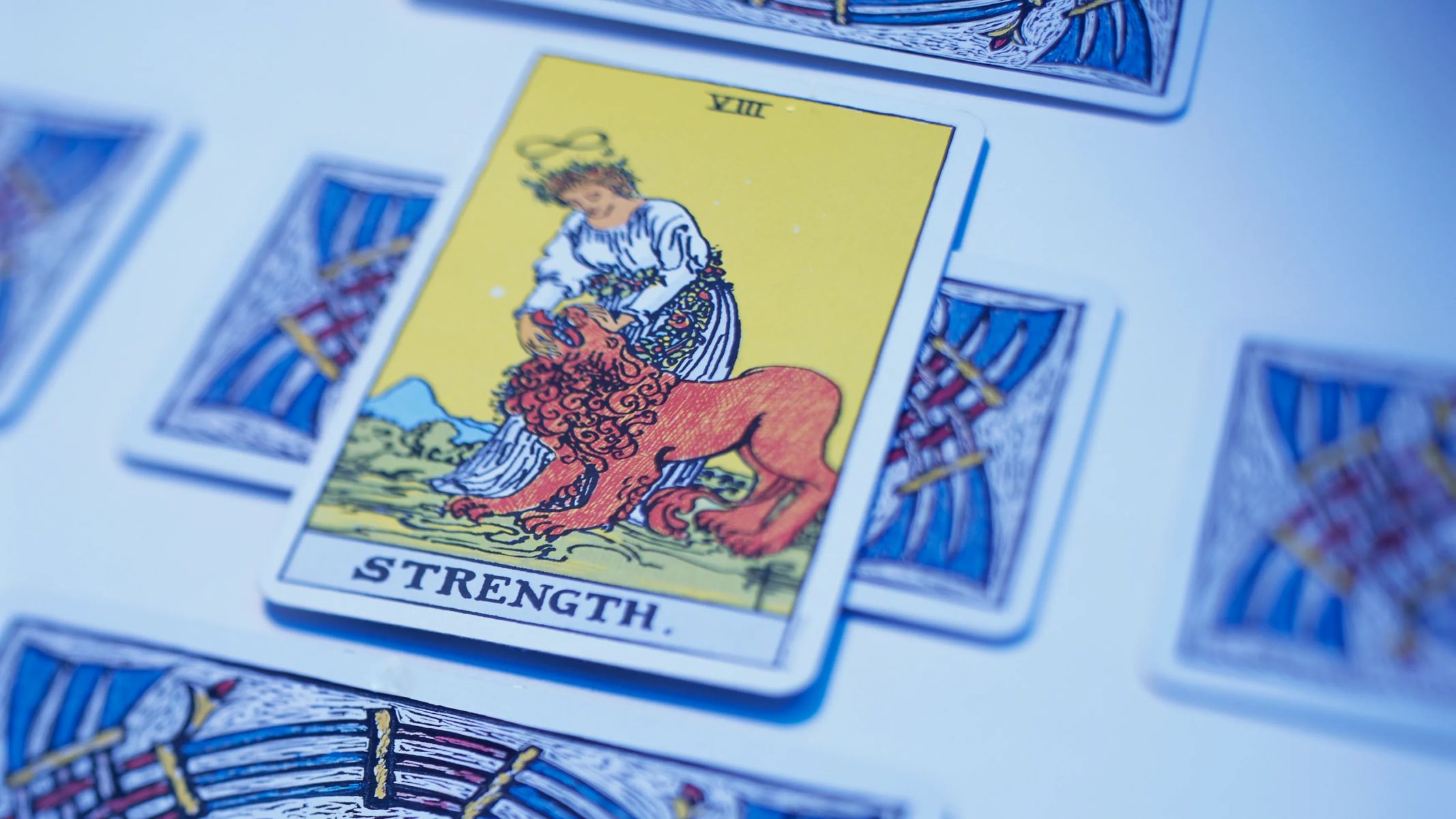 The Surprising Tarot Combination For Your Future With Your Ex: Reversed 9 Of Cups, The Sun, And Strength