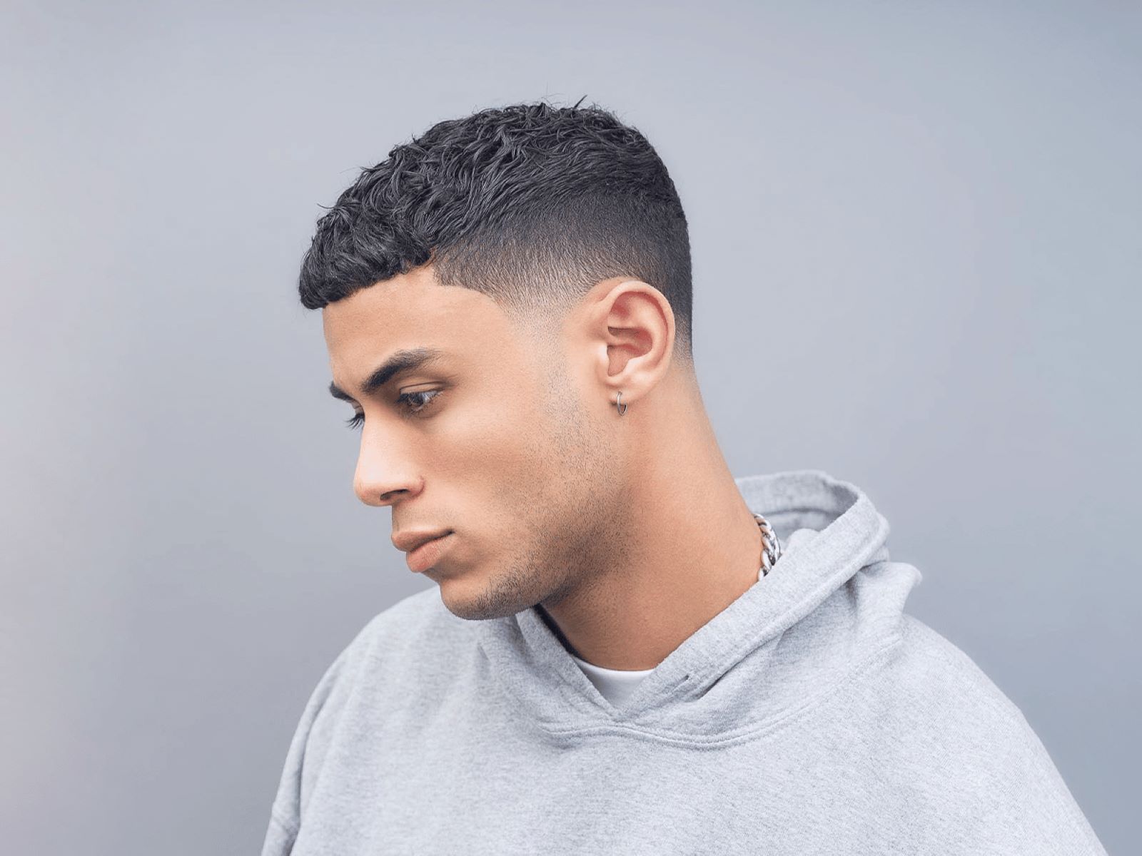 The Ultimate Hair Transformation: Taper Fade Vs. Letting It Grow Out