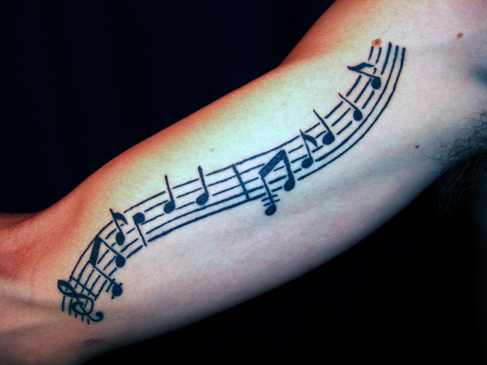 Turn Your Favorite Sheet Music Into A Stunning Tattoo Design!