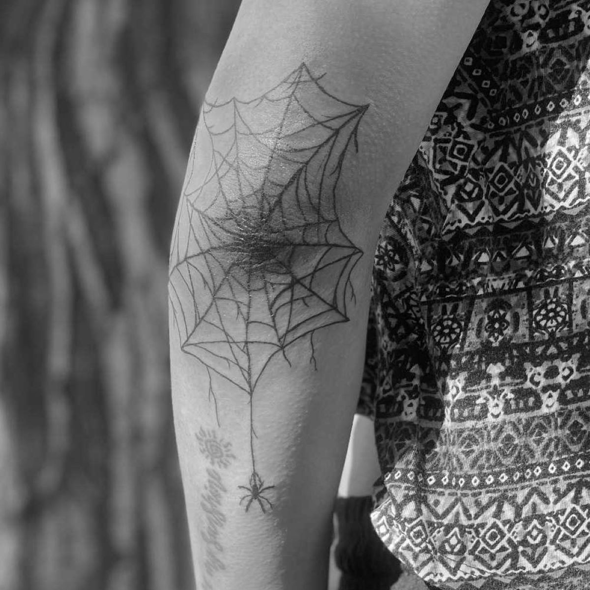 Things To Consider Before Getting A Spider Web Tattoo On Your Elbow